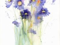 Blue/mauve scabious flowers with green stems