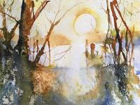 Trees against a yellow sky with frosty foreground with tints of blue 