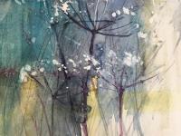 Blue Green fen with hogweed in the foreground. Atmospheric mood