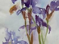 Blue irises against a pale blue background