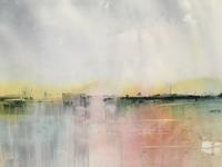 Pink/blue water with boats in the background