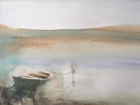 Solitary boat moored in mud flats of Norfolk