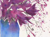 Purple lilies in a blue vase