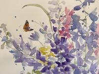 Delphiniums with a butterfly