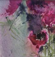 Dark pink anemones growing from the right corner across