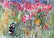 A filed of poppies with Poppy the calico cat sitting in the corner
